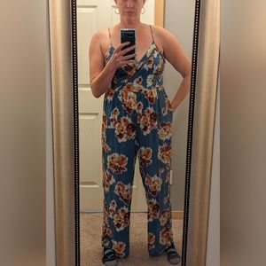 Strappy jumpsuit/romper with pockets!